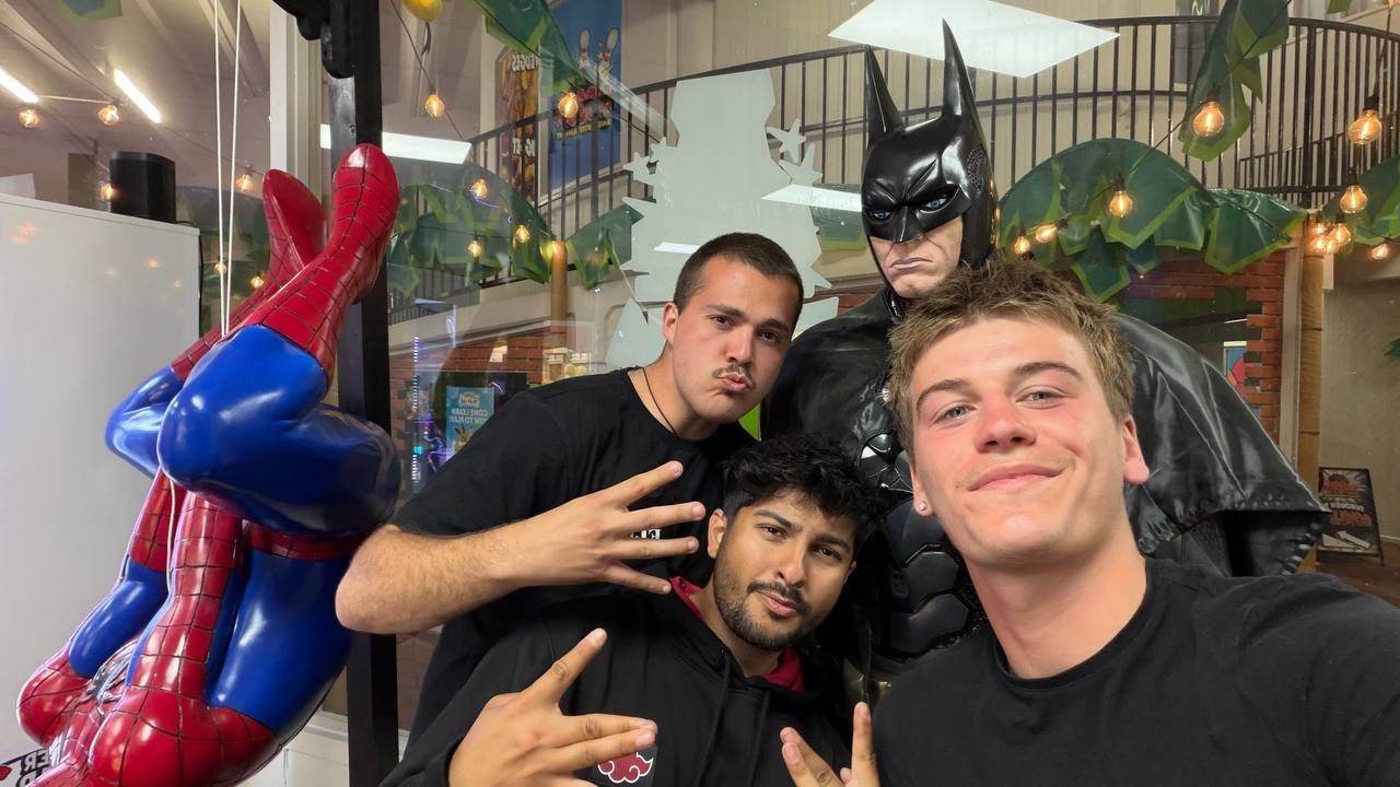 Three team members posing for a selfie