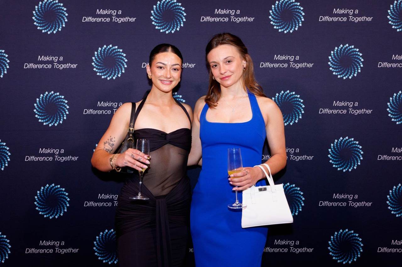 Two team members on the red carpet