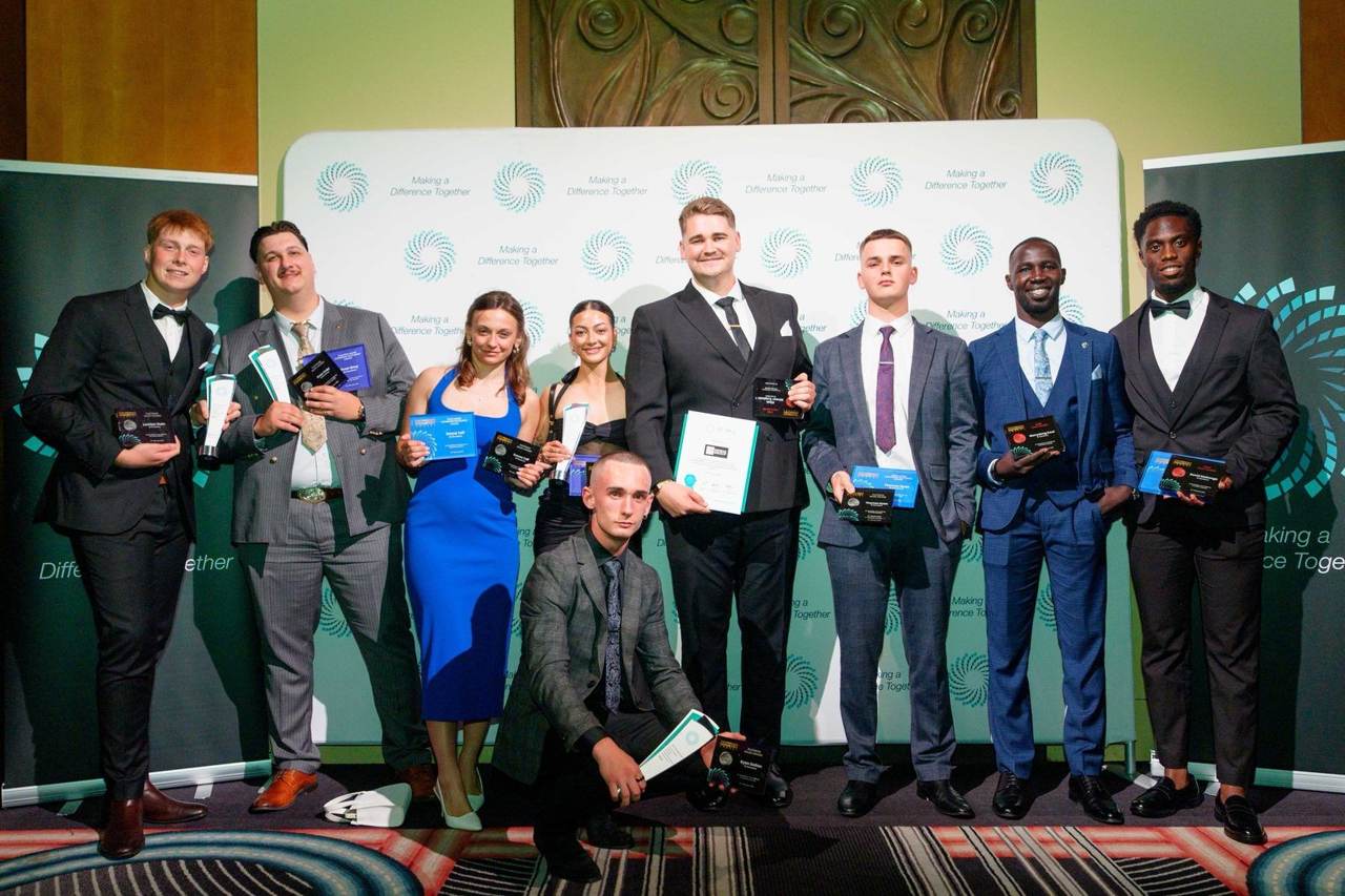 Minear Group leaders with their FIN Gala awards