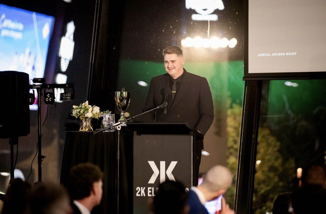 Elijah speaking at the awards night podium