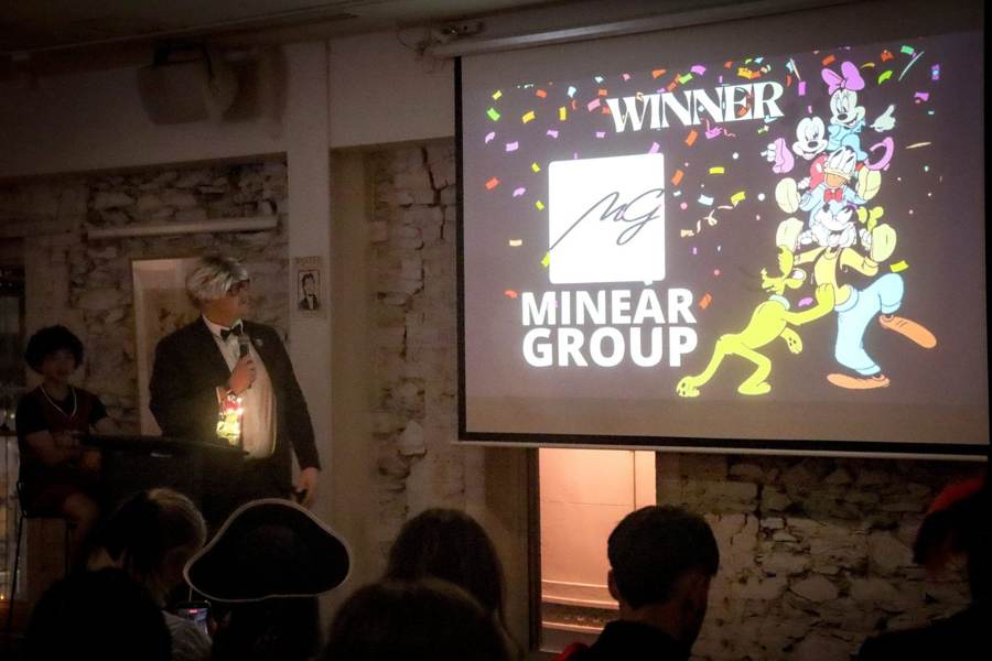 The big screen announcing Minear Group as the winner