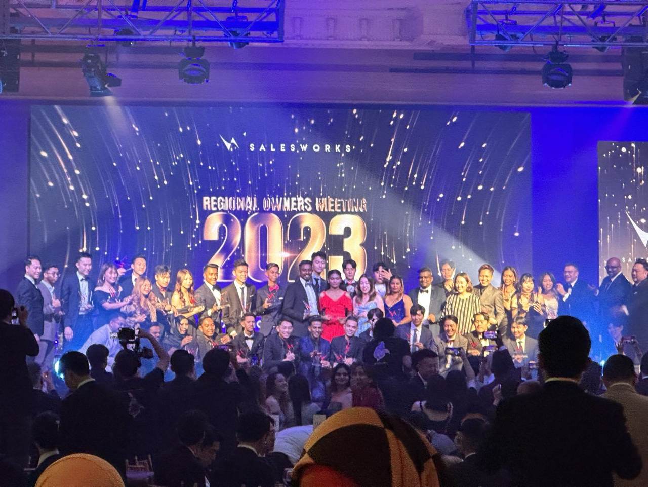 Award winners on stage at an international conference in Malaysia