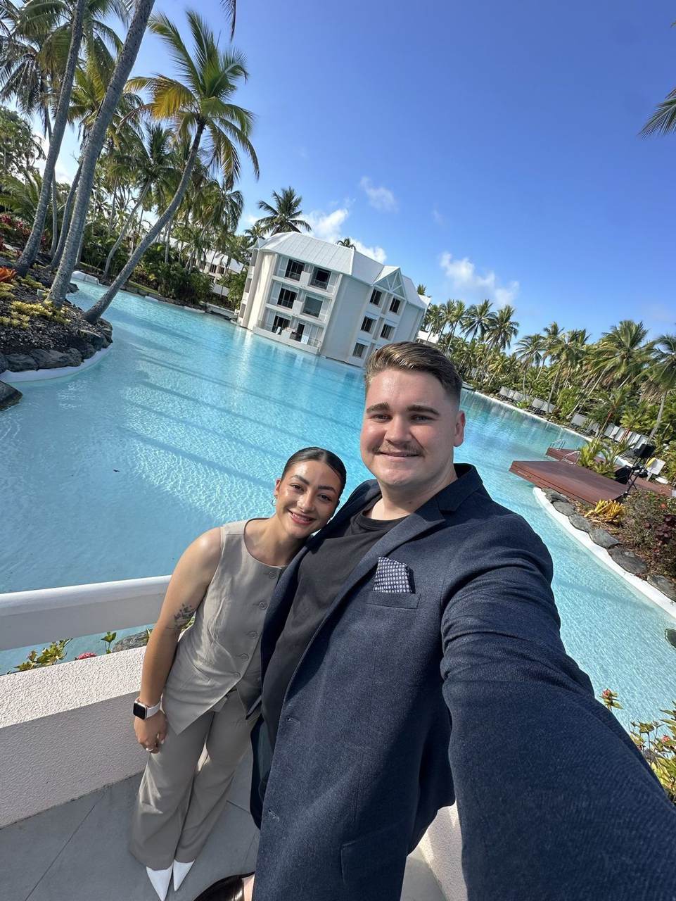 Selfie at a tropical resort pool